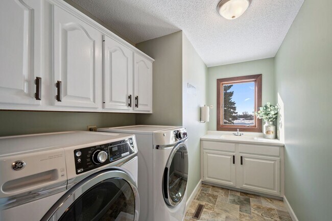 Building Photo - Executive-Level Rental Offering in SW Woodbury — Space, Privacy & High-End Finishes