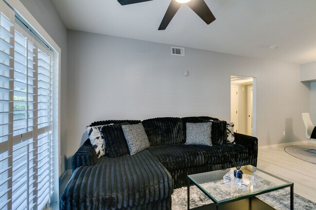 Building Photo - Stylish Fully Furnished 1BR Condo with Private Patio & Custom Closet