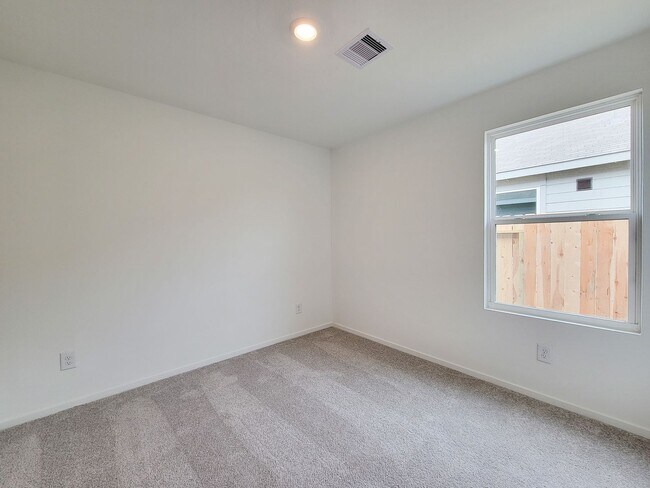 Building Photo - This great new single-story design makes smart use of the space available. At the front are all t...