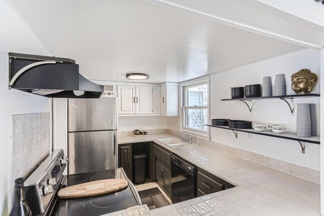 Building Photo - 5636 Twin Lake Terrace N