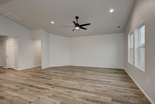 Building Photo - The 3 bedroom, 2 bedroom home also has a f...