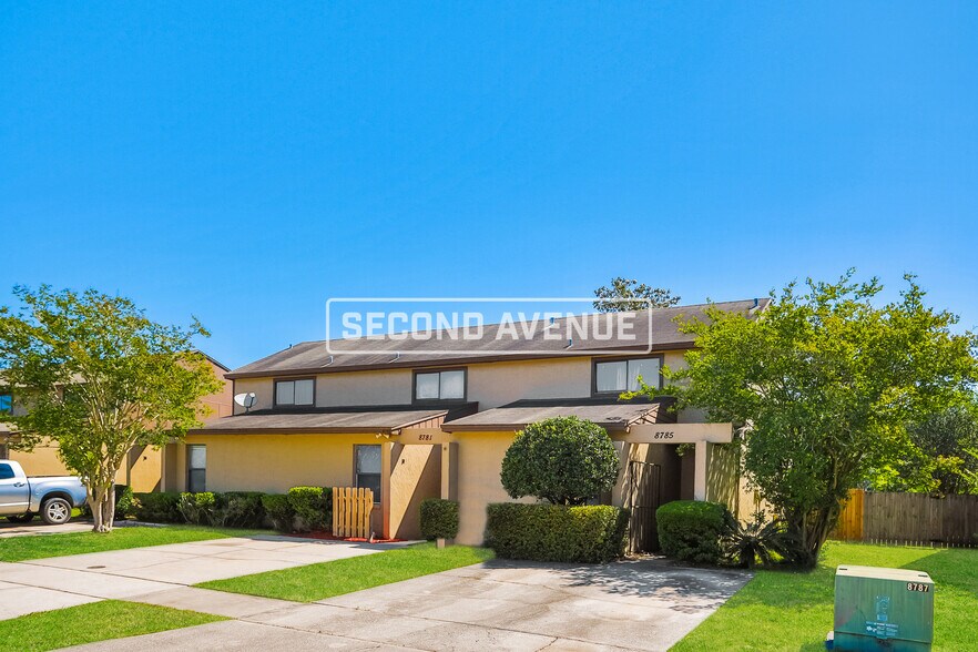 Building Photo - 8781 Whispering Pines Dr