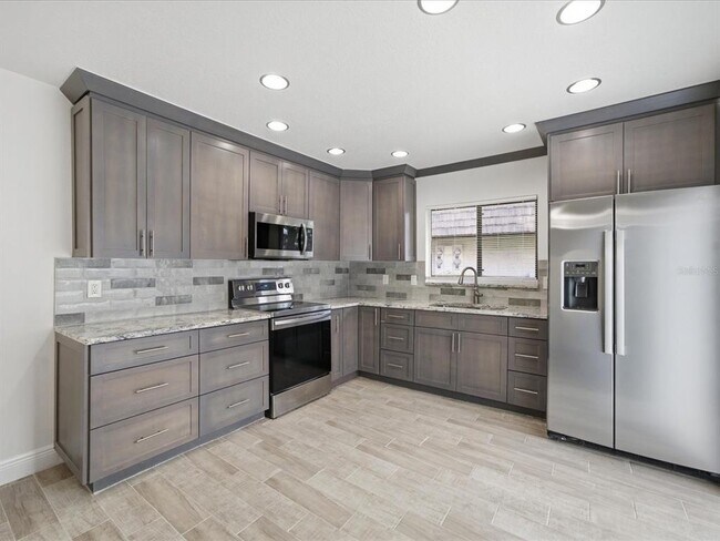 Building Photo - 15446 E Pond Woods Dr