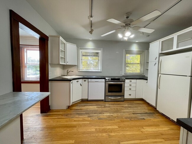 Building Photo - $0 DEPOSIT OPTION, NEW PAINT, TRADITIONAL BRICK HOME, WALKING DISTANCE TO DU!! LARGE BACKYARD, DE...