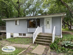 Building Photo - 4 Bedroom Home One Block from Medicine Lake