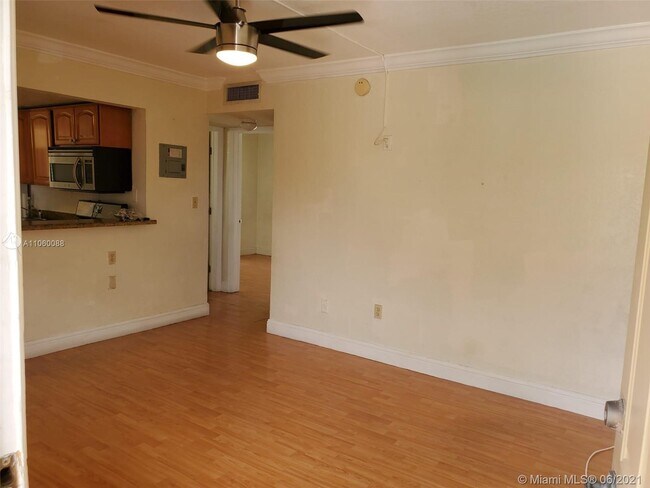 Building Photo - 241 S Royal Poinciana Blvd