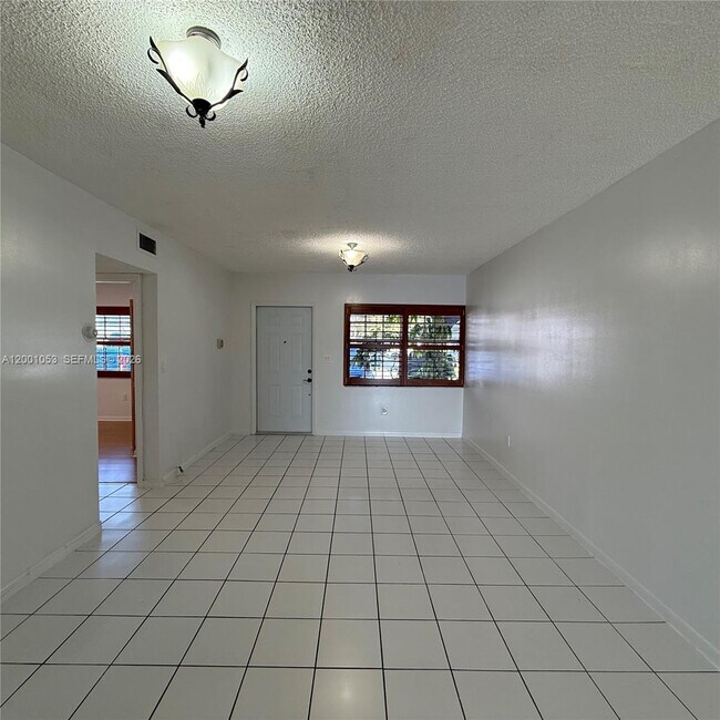 Building Photo - 6980 NW 173rd Dr