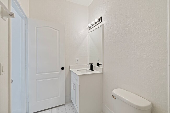 Building Photo - 2-bath condo on the 2nd floor with a newly...
