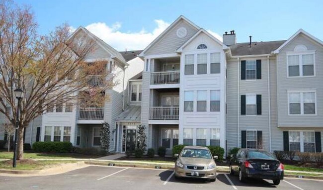 Building Photo - 7518 Snowpea Court, Unit E