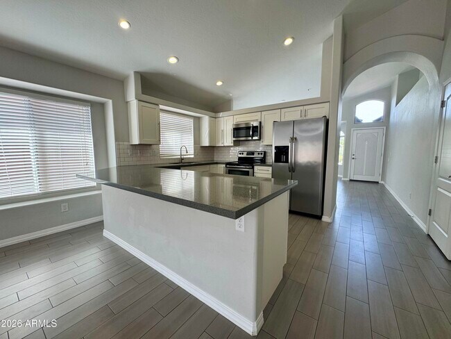 Building Photo - 8667 E Pinchot Ave