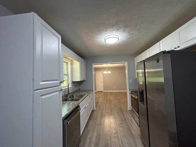 Building Photo - **ASK HOW YOU CAN MOVE IN WITH NO SECURITY DEPOSIT**8546 East Union Hill Rd: Ranch Home with 16x2...