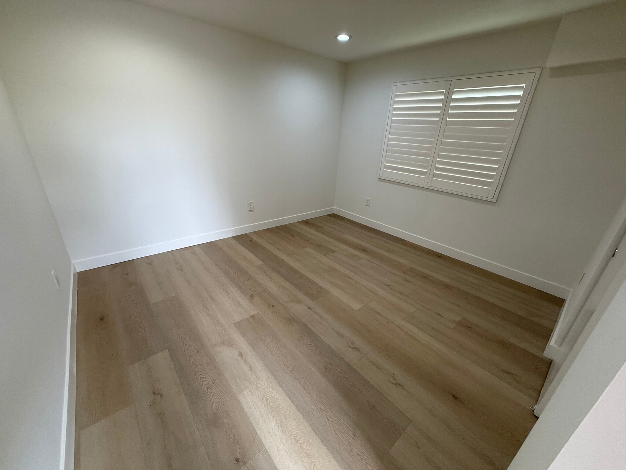 1ST BEDROOM NEW FLOORING - 646 N Serrano Ave