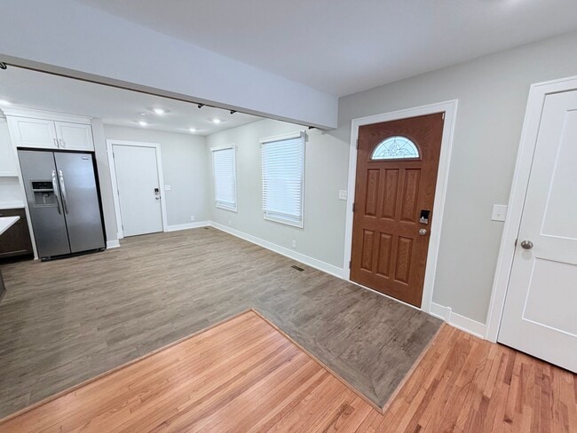 Building Photo - Spacious 4-Bedroom Home with Pond Views & EV-Ready Garage – Bloomington!!