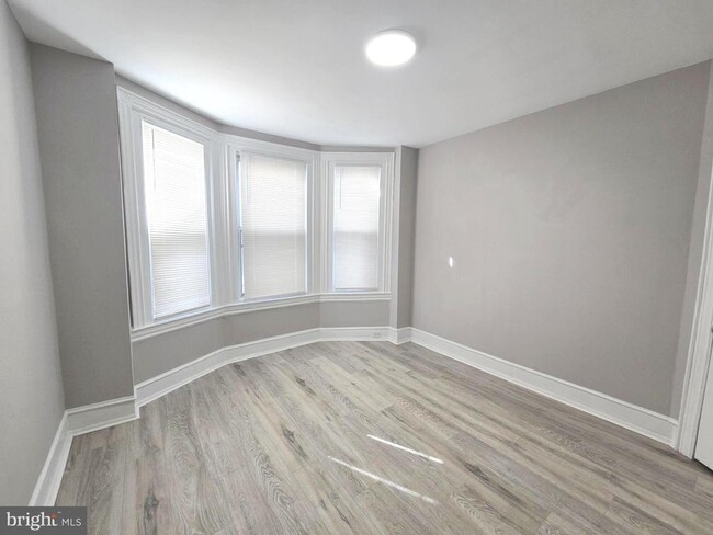 Building Photo - 5011 Larchwood Ave