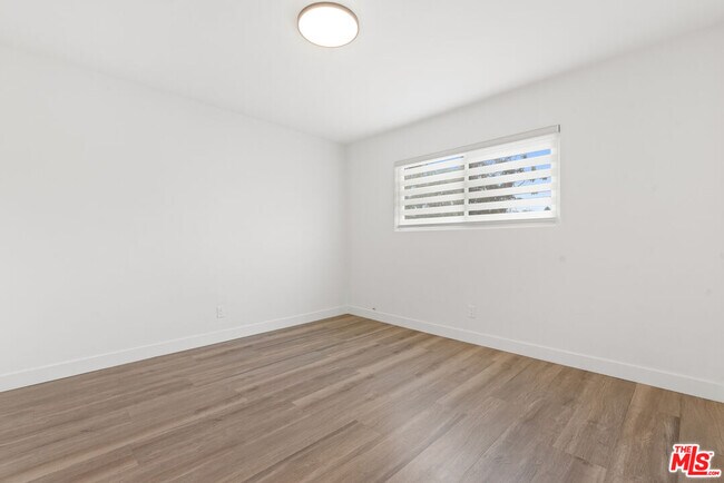 Building Photo - 3707 S Canfield Ave