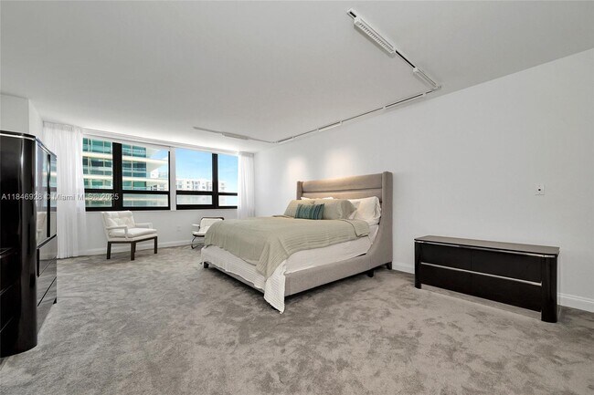 Building Photo - 10205 Collins Ave