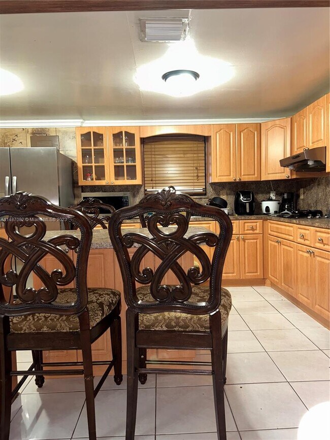 Building Photo - 5891 W 9th Ln