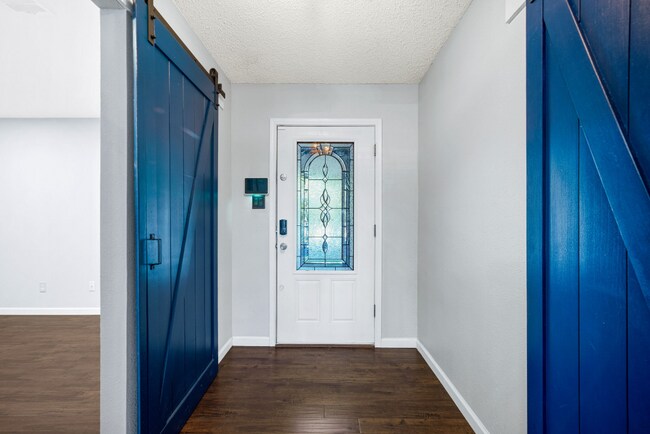 Building Photo - Sign your lease and receive a FREE 50" TV!!!  "Spacious 4-Bedroom Retreat with Fireplace in Charm...