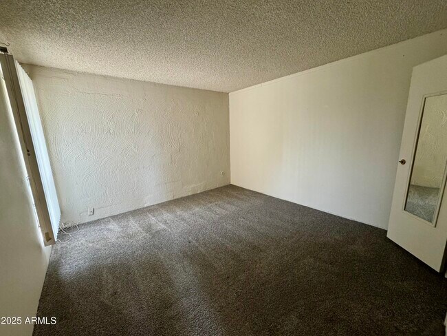 Building Photo - 7625 E Camelback Rd