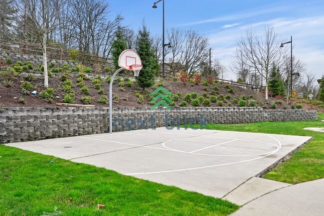 Building Photo - A Beautiful Corner Home Designed for Comfort, Light & Community!