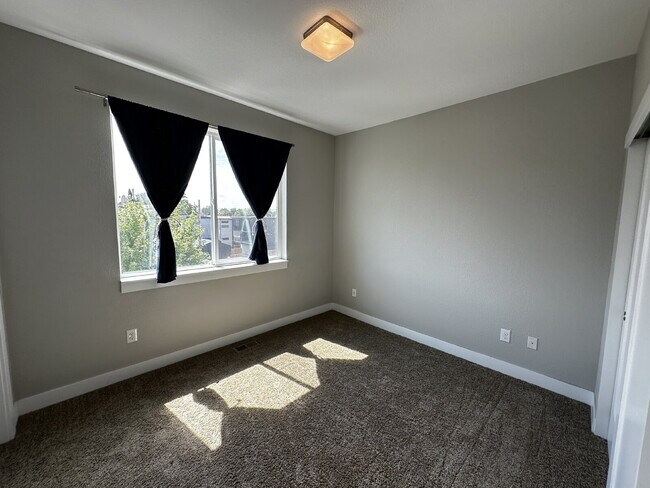 Building Photo - "Experience Modern Comfort: Spacious 2-Bed...