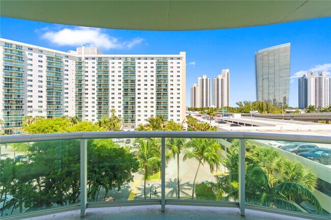 Building Photo - 19390 Collins Ave