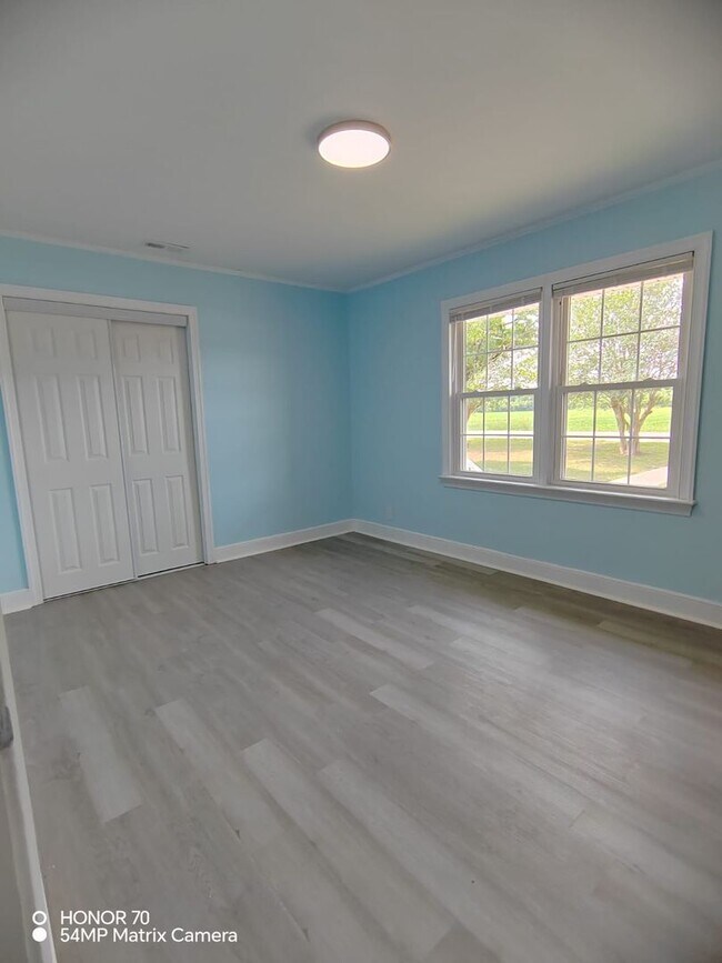 Building Photo - Charming 4-Bedroom Home for Rent – Peaceful & Nature-Filled Setting