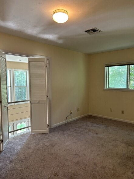Master Bedroom w Balcony - 1488 Mitchell Ave