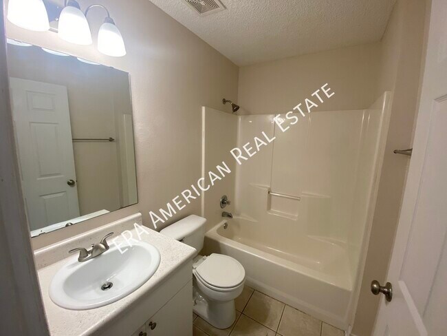 Building Photo - 7418 Woodmont Rd