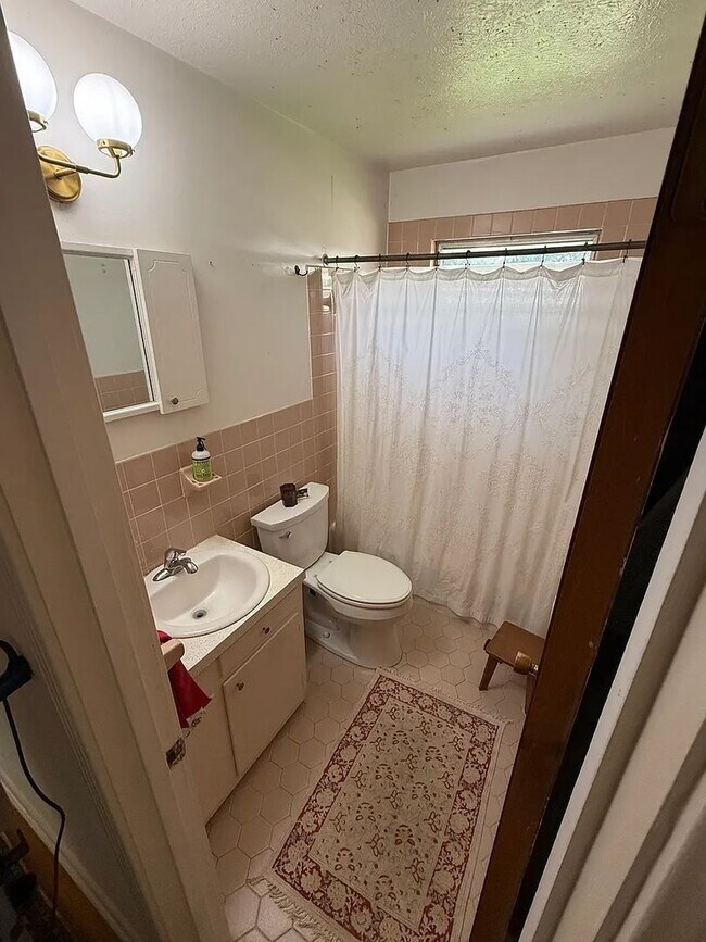 Building Photo - West Asheville Home with Private Fenced Yard & Spacious Layout