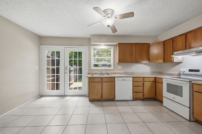 Building Photo - "Charming 2-Bedroom Duplex in White Settlement!"
