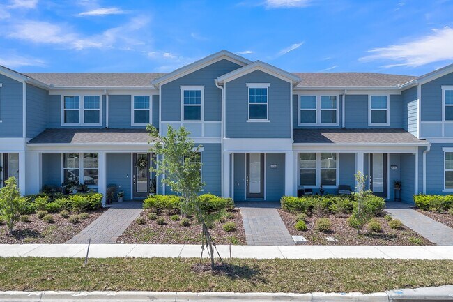 Building Photo - Luxurious Townhome in Lake Nona - A Perfec...