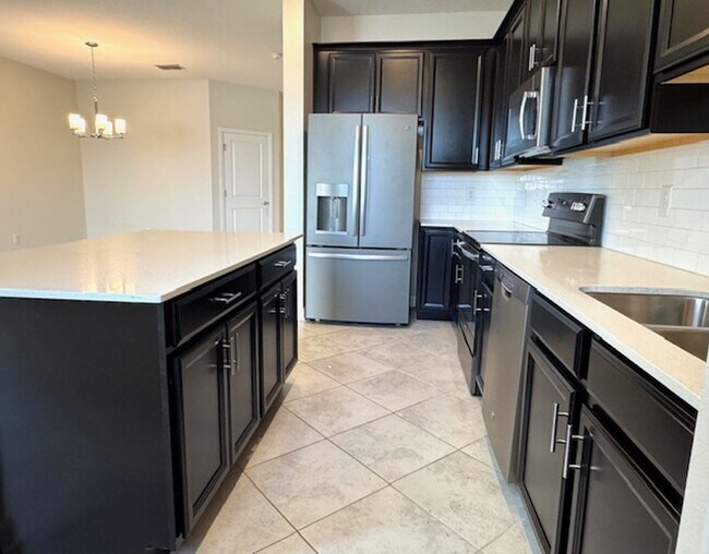 Building Photo - For Rent in ChampionsGate 3/2.5 Townhouse with Water View