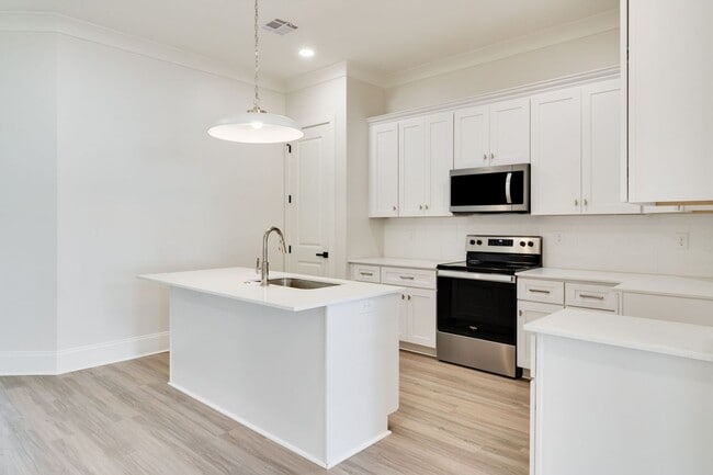 Building Photo - Brand New Upscale Single Story Townhome with private office