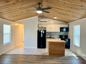 Building Photo - Cute newer home with large fenced yard!