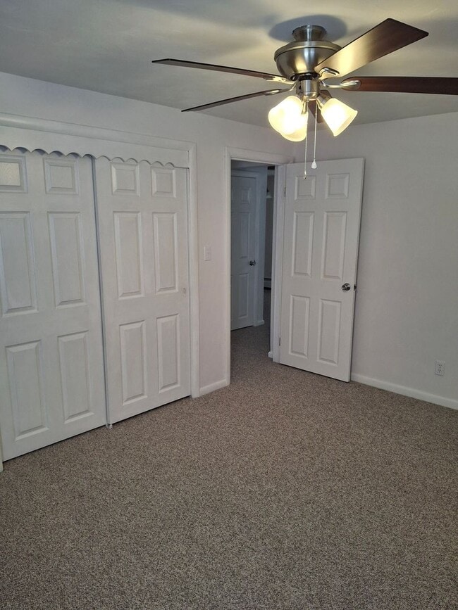 Building Photo - Charming 3-Bedroom Home with Backyard & Of...
