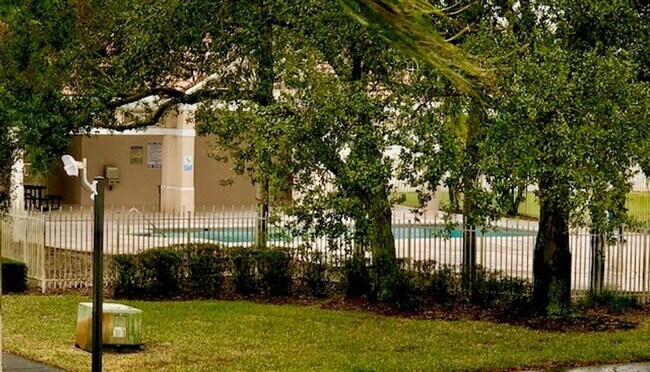 Building Photo - Nice 2X2 located on 2nd floor- Tile & lami...