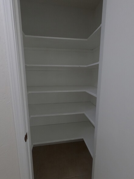 Inside view of pantry in hall (with interior lighting) - 415 W Guthrie St