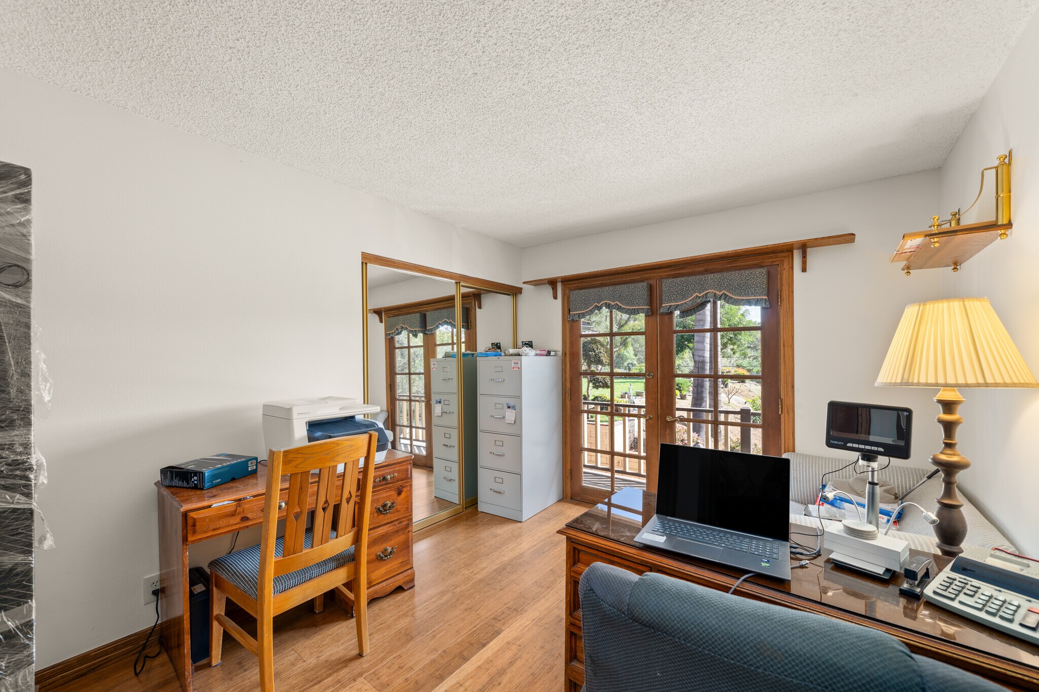 3rd large bedroom with fully cedared wood closet Used as Home Office with full view - 1557 E Puente St