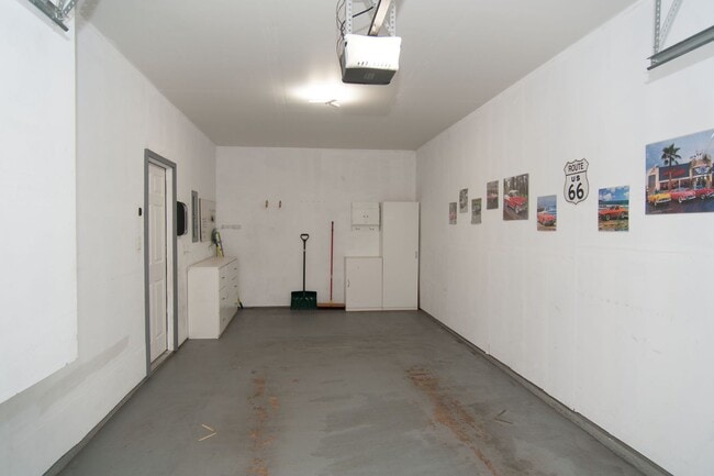 Building Photo - Updated and Bright 2B/2B with Attached Garage Now Available!