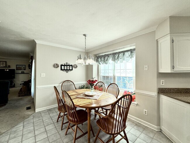 Building Photo - Fabulous 4-Bedroom Home w/2-Car Attached Garage! Dog Friendly - Screened Porch!