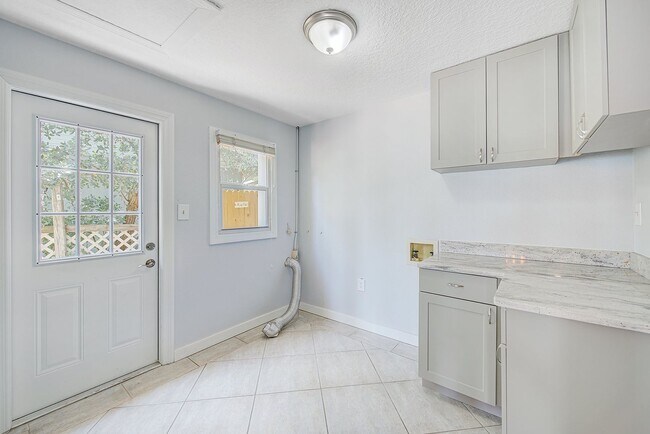 Building Photo - 3/2 Just Steps to the Intercoastal with Boat Ramp and Dock