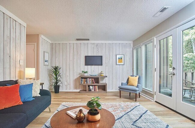Building Photo - Mid-Century Modern Gem: Renovated 2BR Loft with Pool & Private Patio