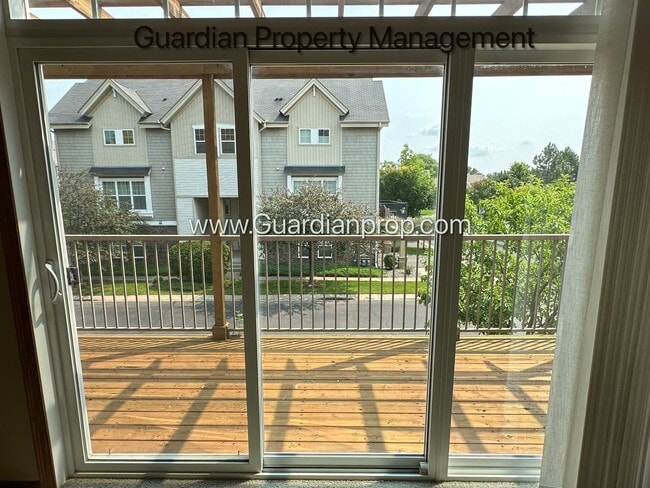 Building Photo - Pet Free Champlin Town Home, 3.5 Baths, 2 Car Garage, Dishwasher, Balcony, Available end of April