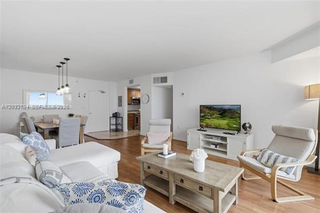 Building Photo - 10275 Collins Ave