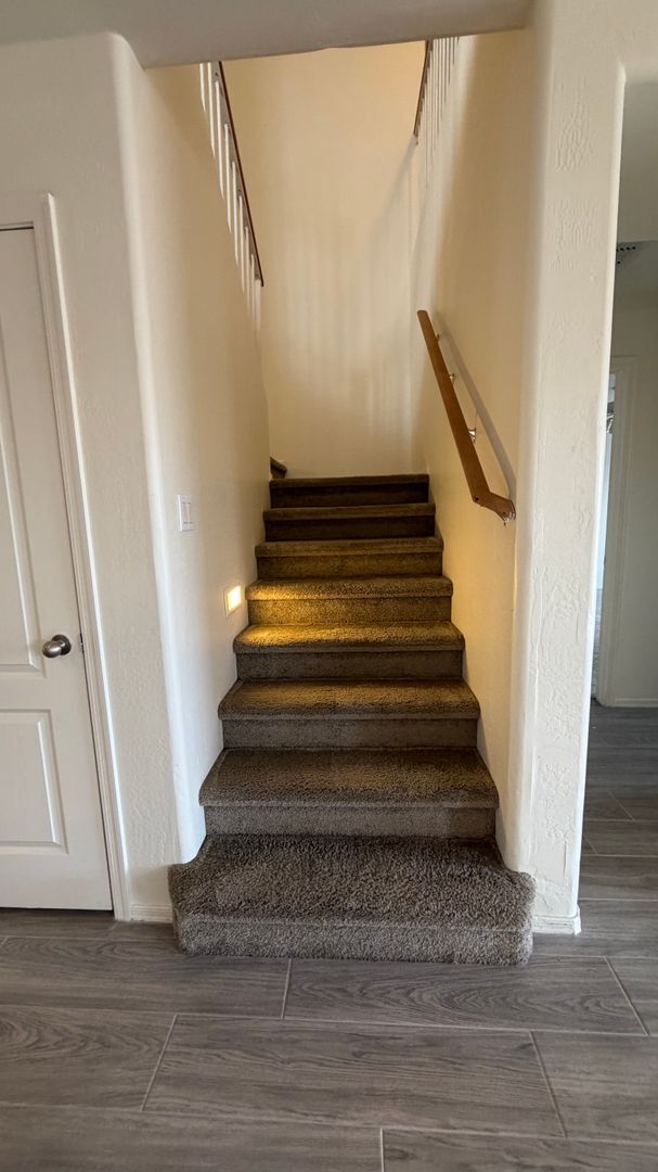 Building Photo - Two Story Home with NEW tile and a large backyard!