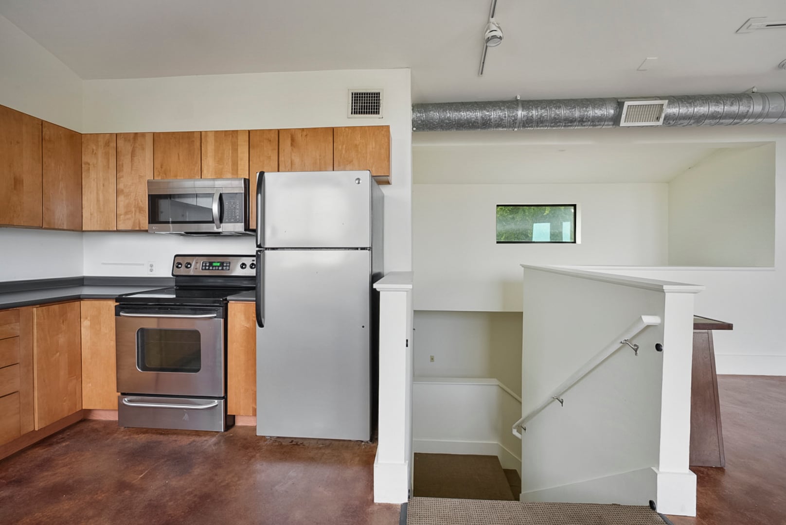 stairs down to main level - 911 Keith Ln