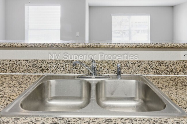 Building Photo - SW!! First floor unit with Balcony!! Gated!! Clubhouse!!  Community pool!! Spa!! Exercise Room!! ...
