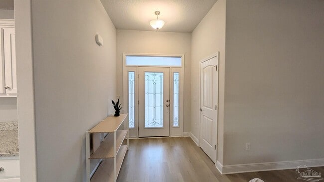 Building Photo - 5693 Old Stone Blvd