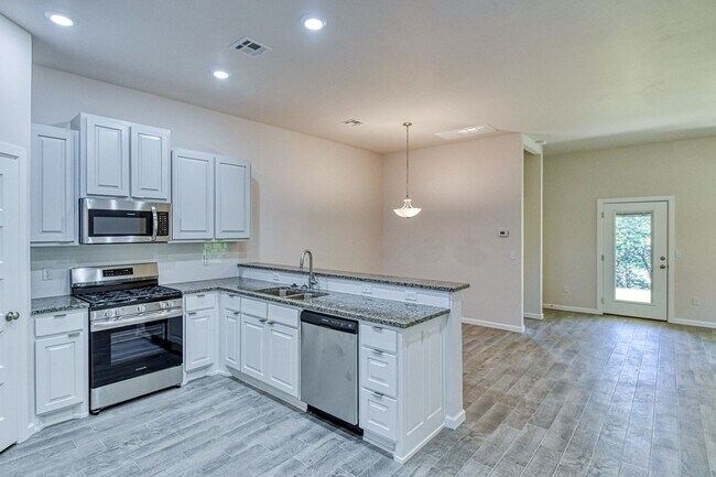 Building Photo - Brand New Construction!  Lawn care provided!